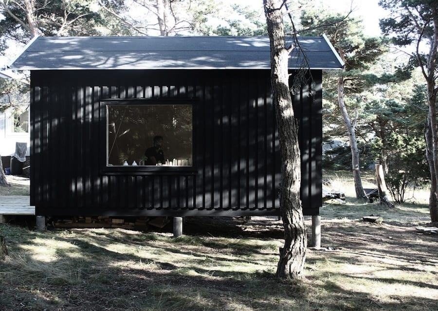 Compact Plywood And Pine Cabin With Attached Sauna