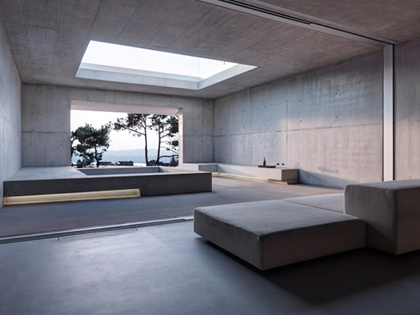 contemporary-concrete-house-two-verandas-no-windows-3.jpg