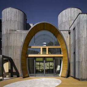 Contemporary Countryside Home with Oval Entrance and Interior Glazing