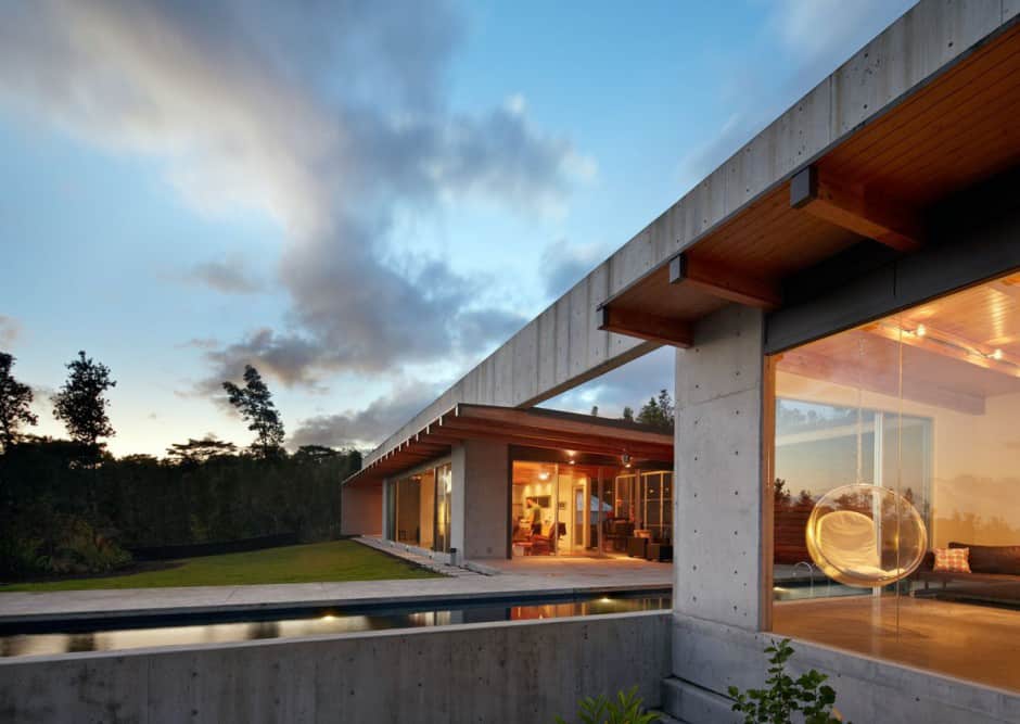 cool concrete house with glass walls captures outdoor living 1