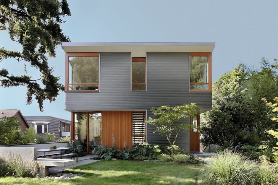 corrugated steel house with warm wood details throughout 1