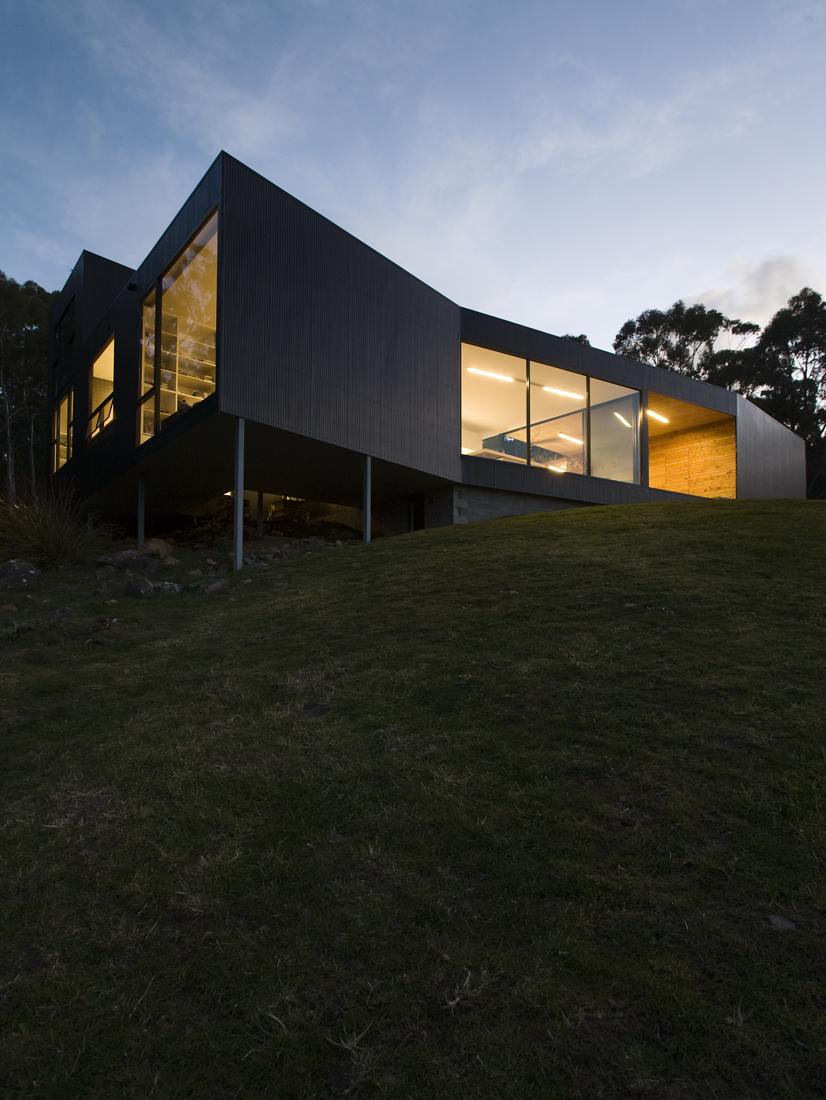 courtyard-house-built-for-severe-tasmanian-weather-4-from-below-angle-night.jpg