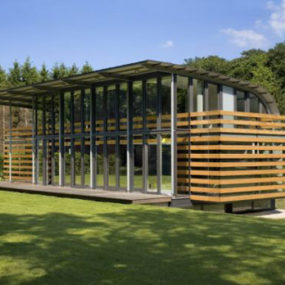 金属屋顶房屋——荷兰建筑师设计的弧形钢屋顶住宅