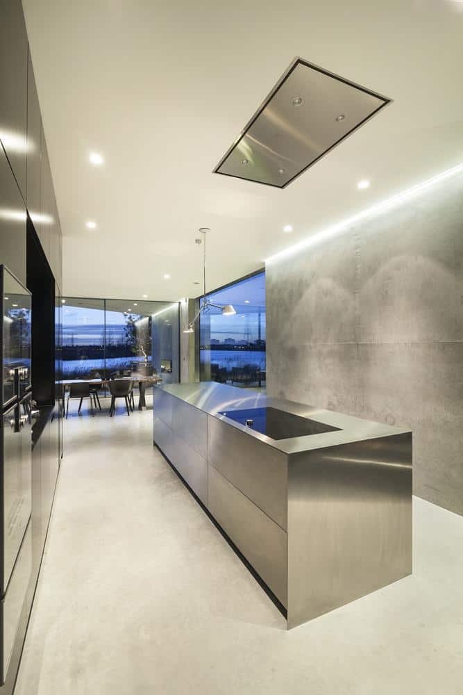 diamond-shaped-house-with-curving-glass-windows-15-kitchen.jpg