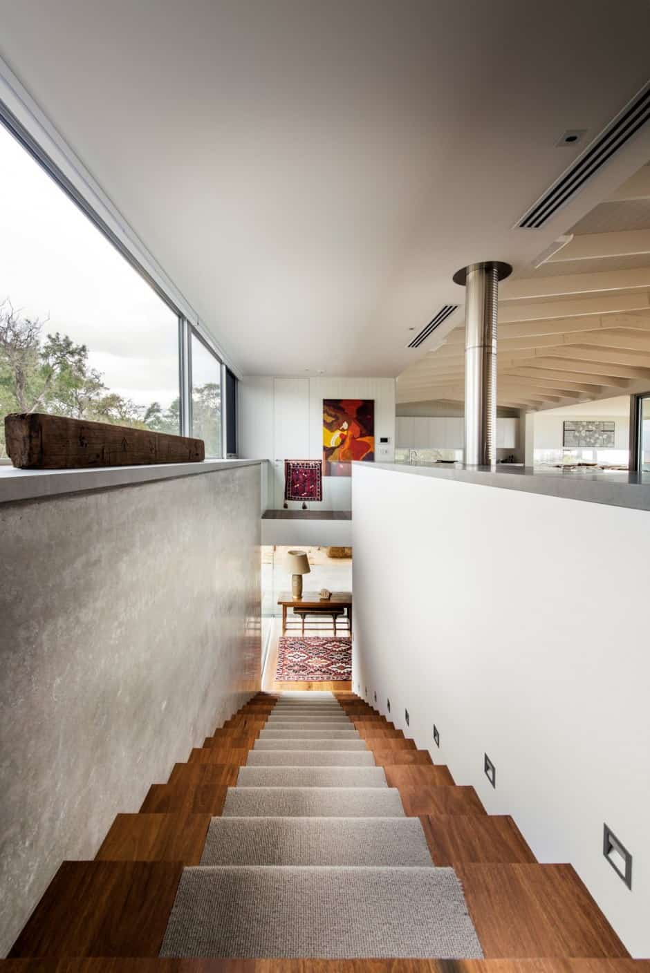 dune house wows with dynamic vaulted ceiling detail 12