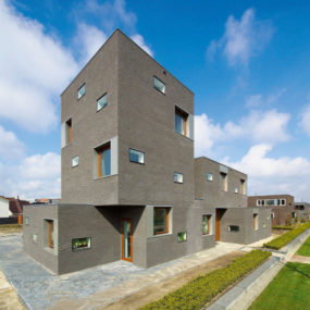Brick House Design in Netherlands – asymmetrical, with two faces