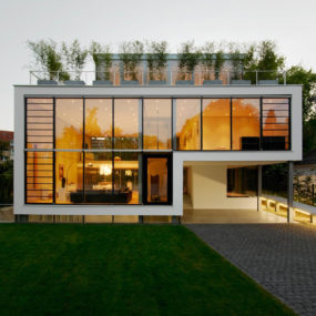 Energy Optimized House with Roof Terrace, Louver Windows, Exterior Window Shutters and Elevator