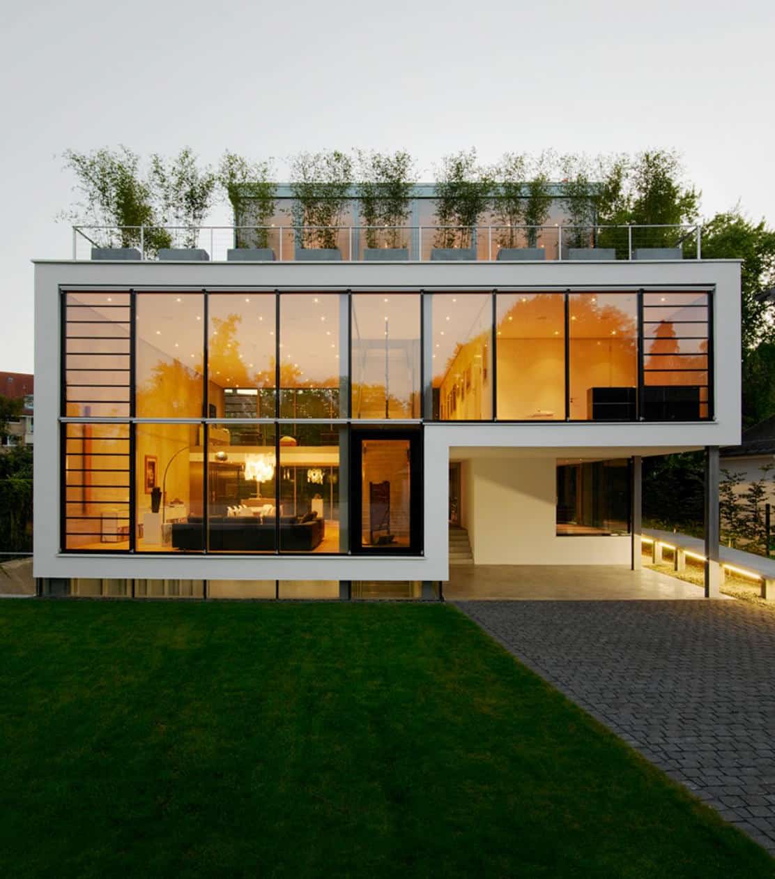 energy optimized house with roof terrace louver windows exterior window shatters and elevator 1