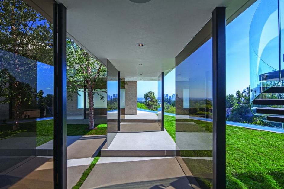 extravagant contemporary beverly hills mansion with creatively luxurious details 7 glass walkway