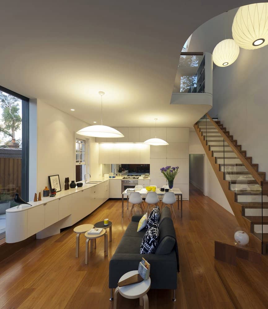 familiar touches modern design sydney home 13 living room stairs night