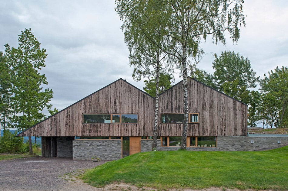 fjord house with m shaped roof and rustic style 1