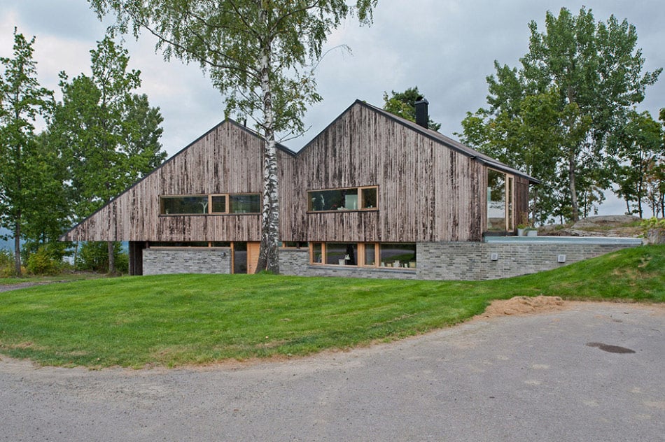 fjord house with m shaped roof and rustic style 2