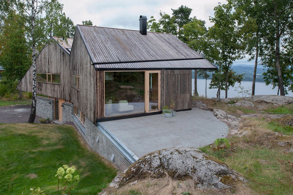 fjord house with m shaped roof and rustic style 4
