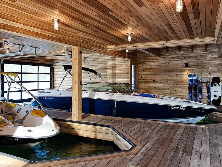Floating Cabin With Integrated Boathouse