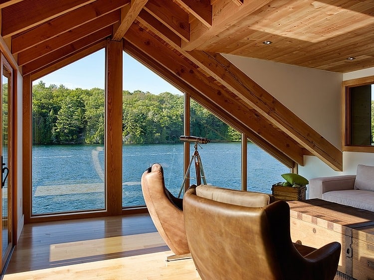 floating wooden one bedroom cabin with integrated boathouse 7 living room