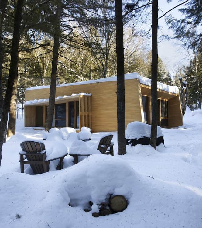 forest-getaway-cabin-dominated-by-warm-wood-boards-2-light-sides.jpg