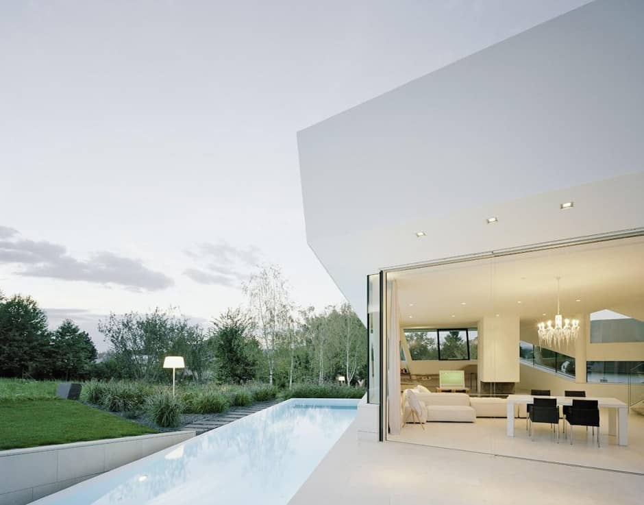 futuristic home with multi faceted shape and minimalist aesthetic 13