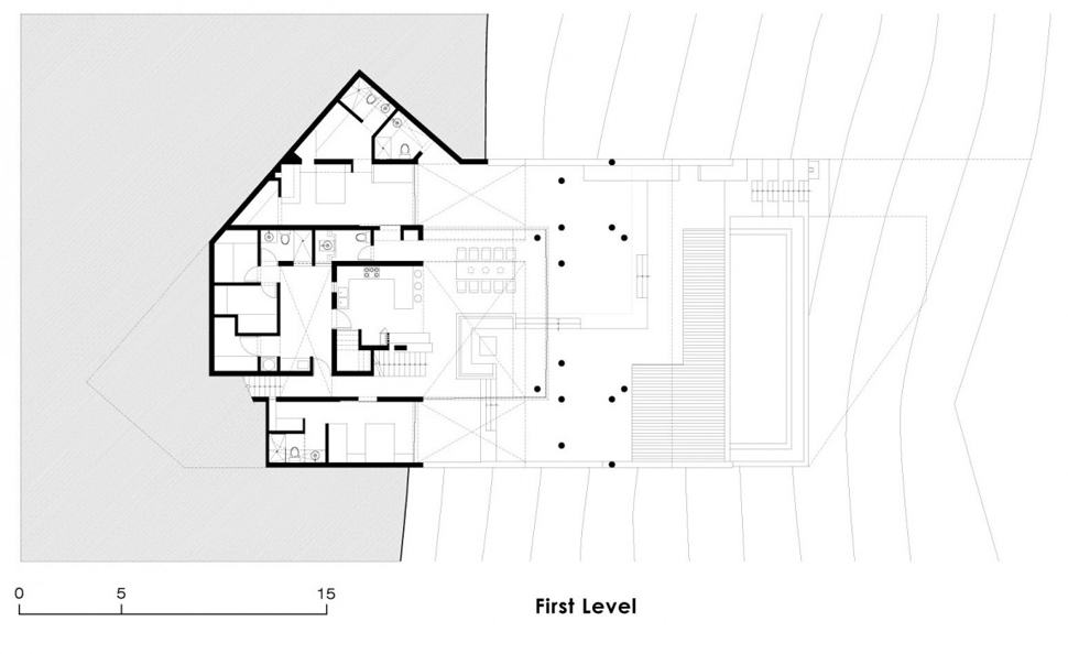 geometric-beach-house-with -floating-glazed-upper-floor-17.jpg