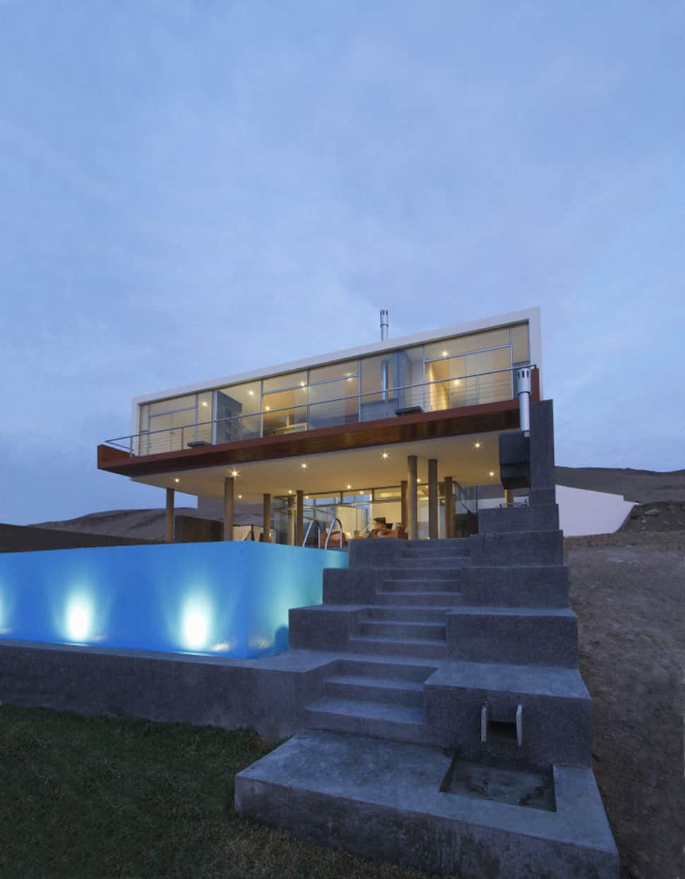geometric beach house with  floating glazed upper floor 2