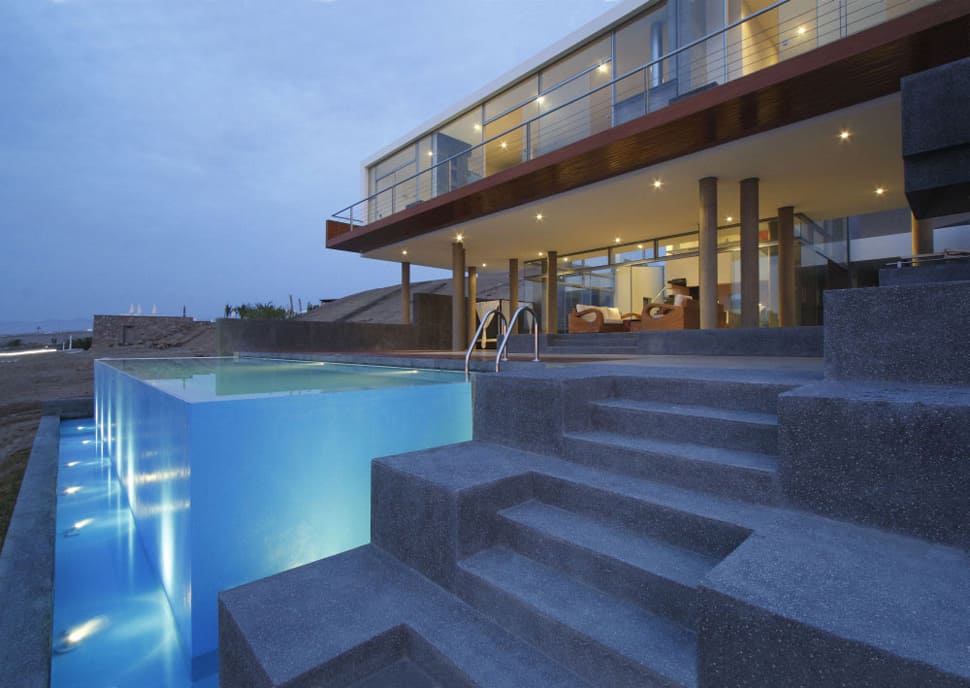 geometric beach house with  floating glazed upper floor 3