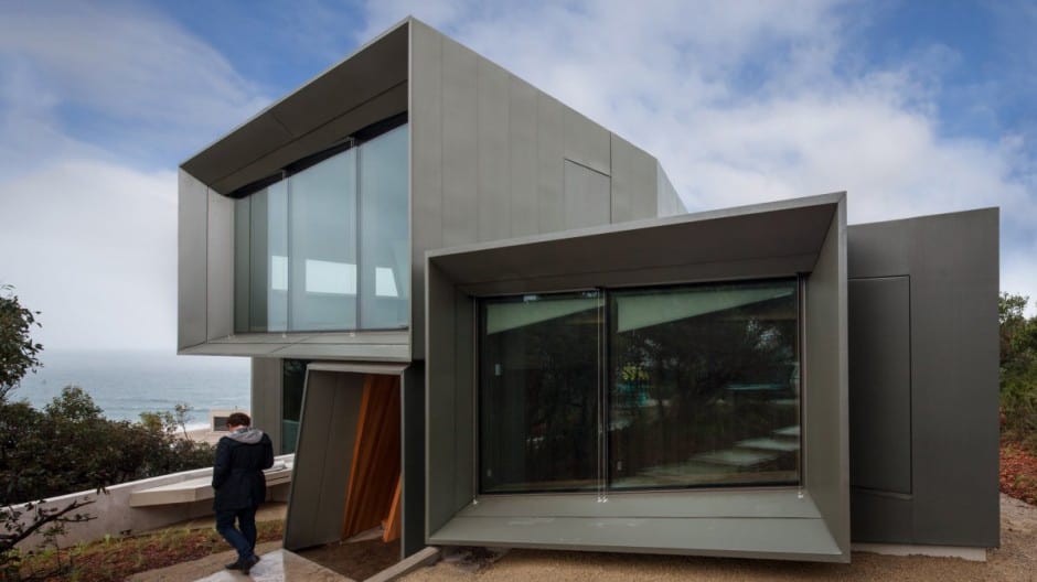 geometric beach house with zinc exterior wood interior 1