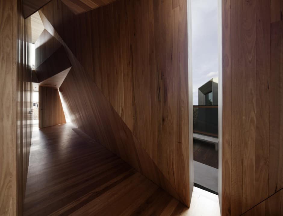 geometric beach house with zinc exterior wood interior 10