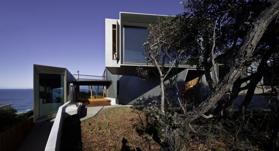 geometric beach house with zinc exterior wood interior 3