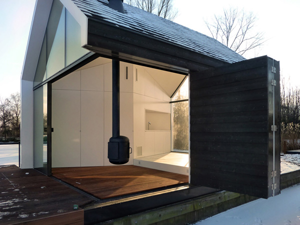 innovative island house with glass facade 2
