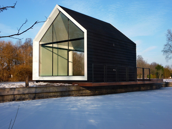 innovative island house with glass facade 4