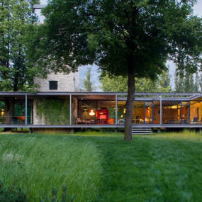Modern Glass Home in Krakow, Poland comes with a tree and a tower!