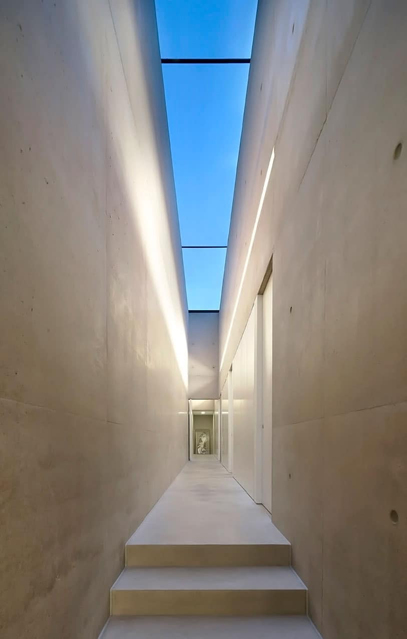 minimal-white-extension-to-traditional-british-home-20-long-interior-hallway.jpg