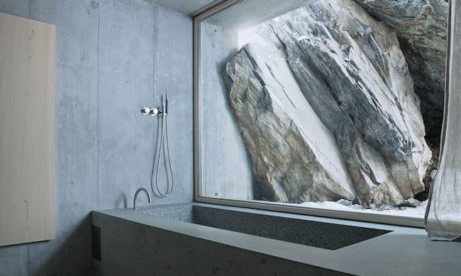minimalist concrete alpine cabin 6 tub