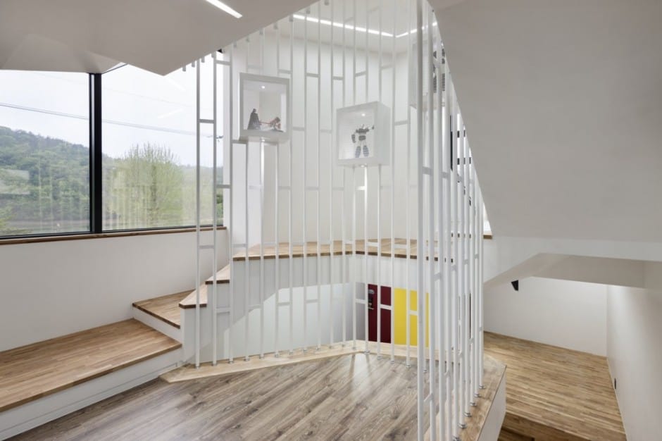 modern geometric house with surprising spiral stair interiors 9