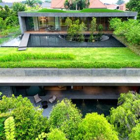 Home with Underground Courtyard and Rooftop Gardens