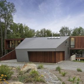 Modern Massachusetts Forest House With Two-Story Ceilings