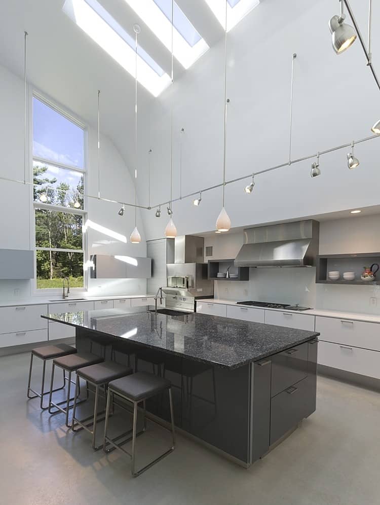 modern-massachusetts-woodland-house-with-two-story-ceilings-9-kitchen-ceilings.jpg
