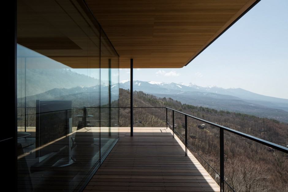 mountain home glass walls and terrace made for views 8