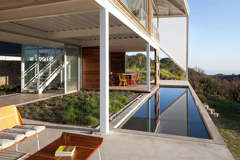 outdoor living house under geometric canopy 8 deck garden