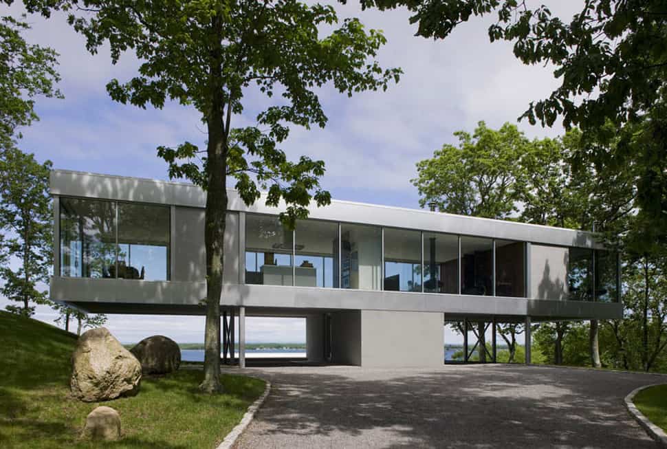 raised-linear-house-enclosed-in-glass-with-open-interior-1.jpg
