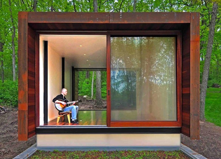 rustic country music studio of glass and rusted steel 5