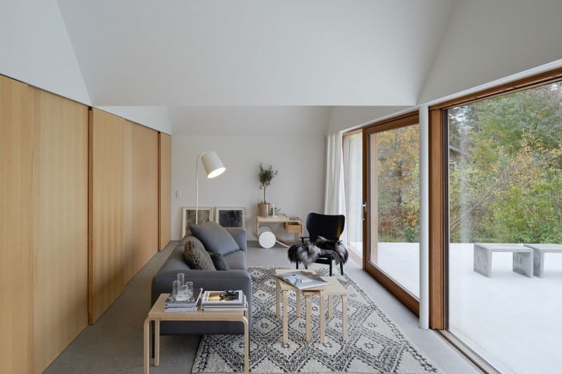 scenic-concrete-glass-home-detached-bedroom-living-room-side.jpg
