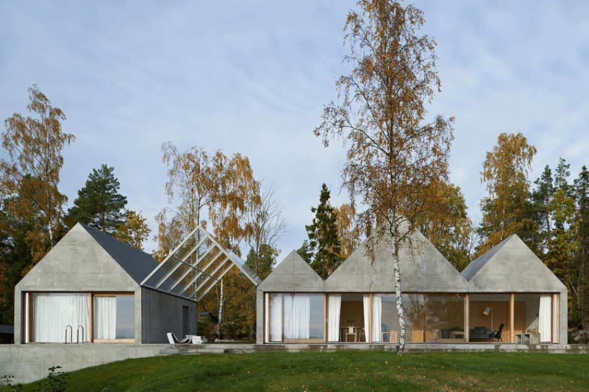 Scenic Swedish Concrete-And-Glass Home With Detached Bedroom