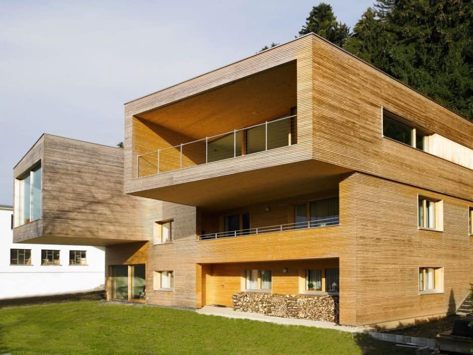 sculptural-wood-house-with-stacked-additions-for-three-families-4.jpg