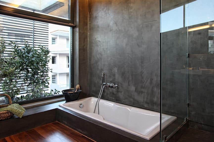 sleek-athens-house-blends-stone-with-concrete-textures-24-master-bath.jpg