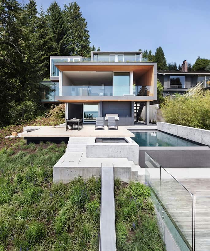 sleek slope house with interior featuring concrete 3 rear straight