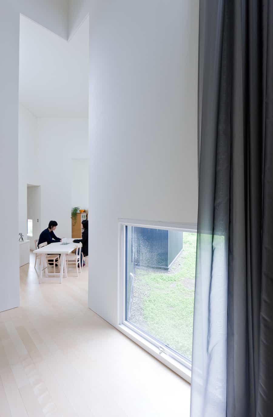 small house big impact with black facade white interiors 8