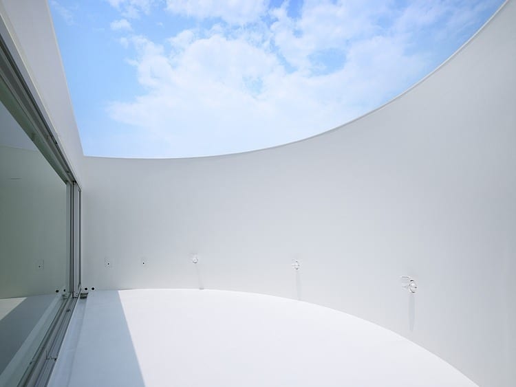spacious oval plan hiroshima home uses light creatively 12 deck daytime
