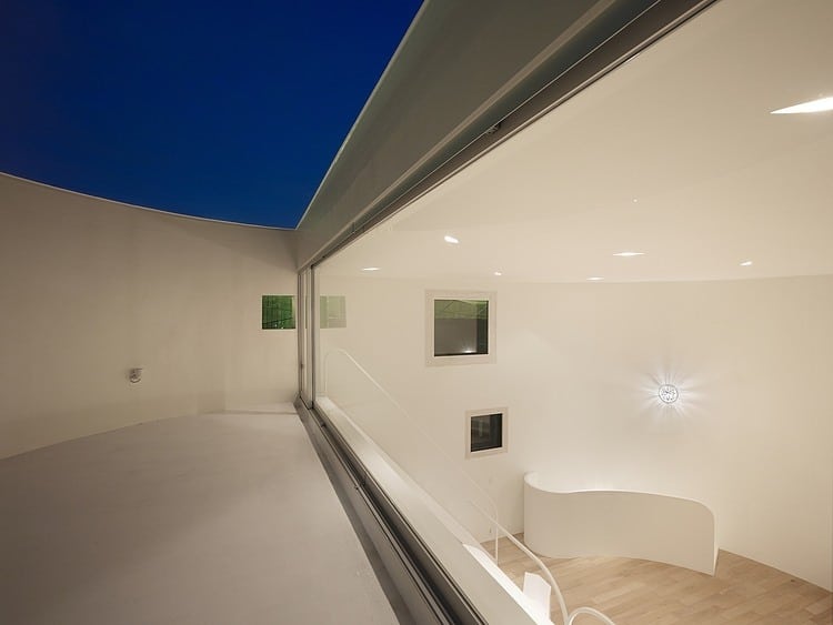 spacious oval plan hiroshima home uses light creatively 13 deck nighttime