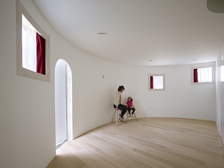 spacious oval plan hiroshima home uses light creatively 5 entry parlor