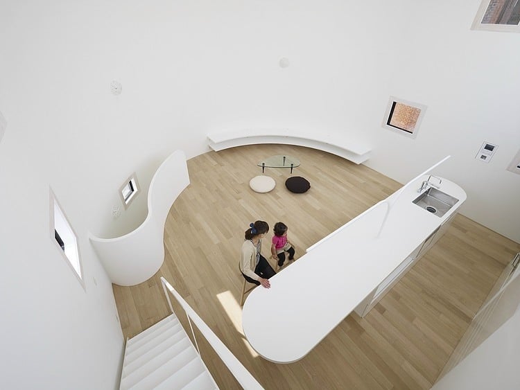 spacious oval plan hiroshima home uses light creatively 9 living room above
